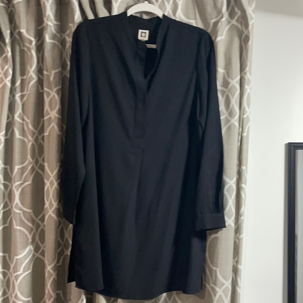 Only wore once. Can be a tunic top or mini dress.